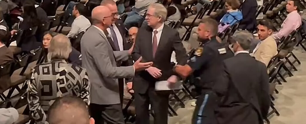 MyPatriotsNetwork-Berkshire Hathaway Investor Hauled Off at Shareholder Meeting for Pointing Out Ties to Jeffrey Epstein