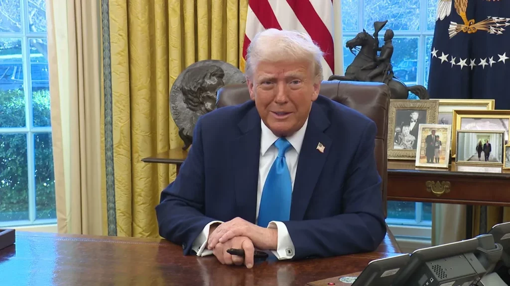 The White House shows us president trump signing executive orders in the oval office